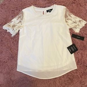 White shirt with lace sleeves